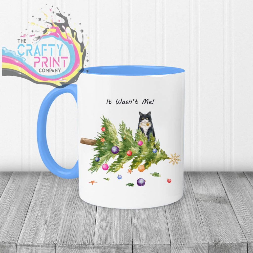 It wasn’t me Christmas Tree Cat Mug - Blue Handle & Inner